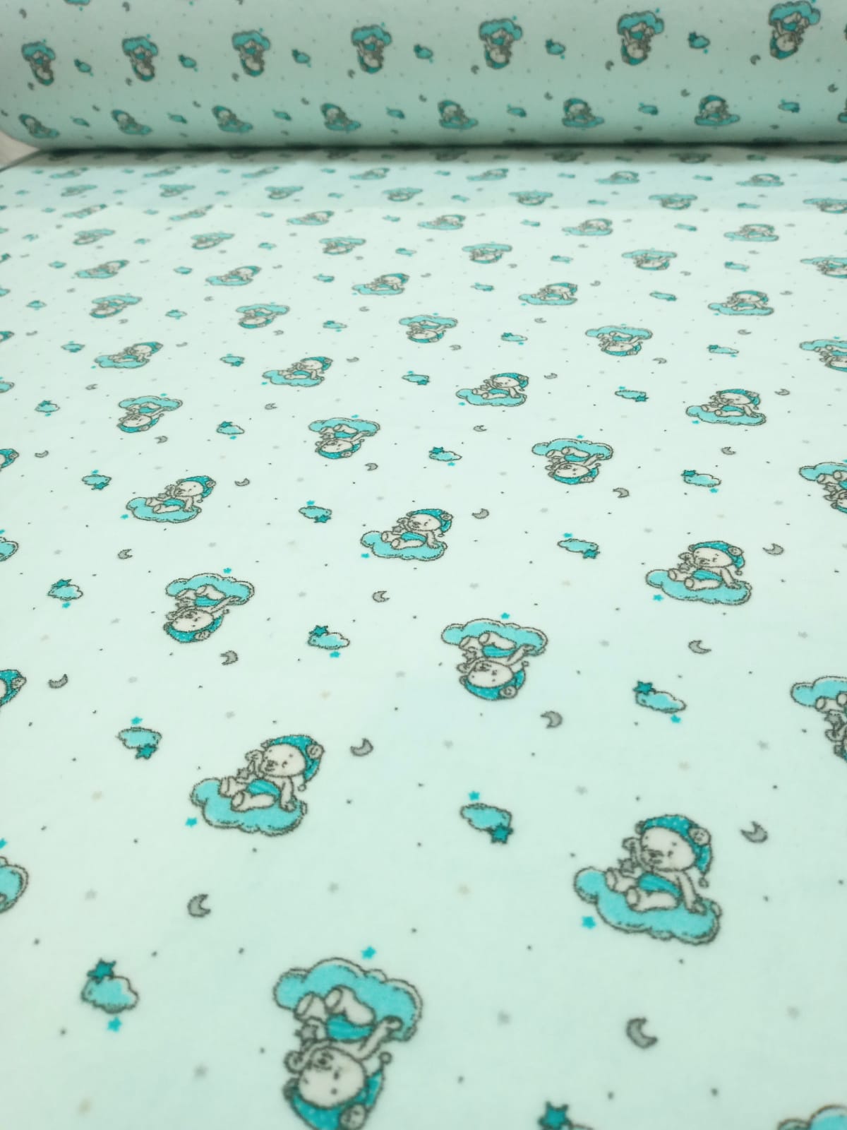 imagen de Plush estampado ositos con base verde aqua