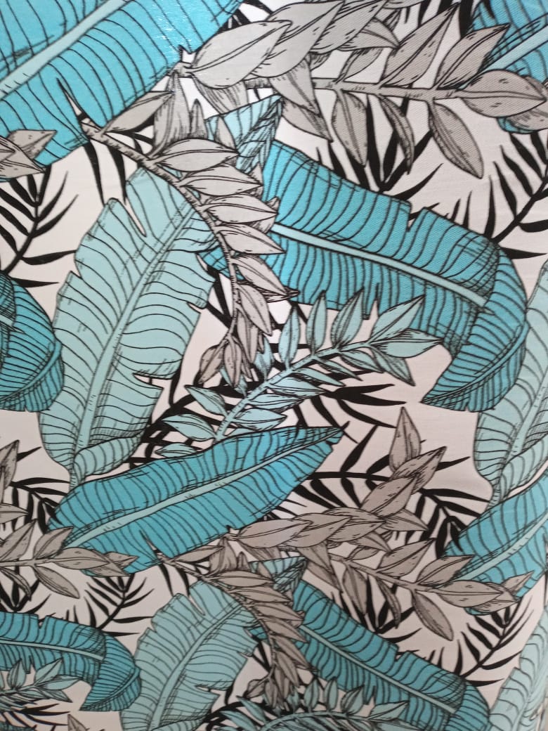 imagen de Gabardina hojas turquesa