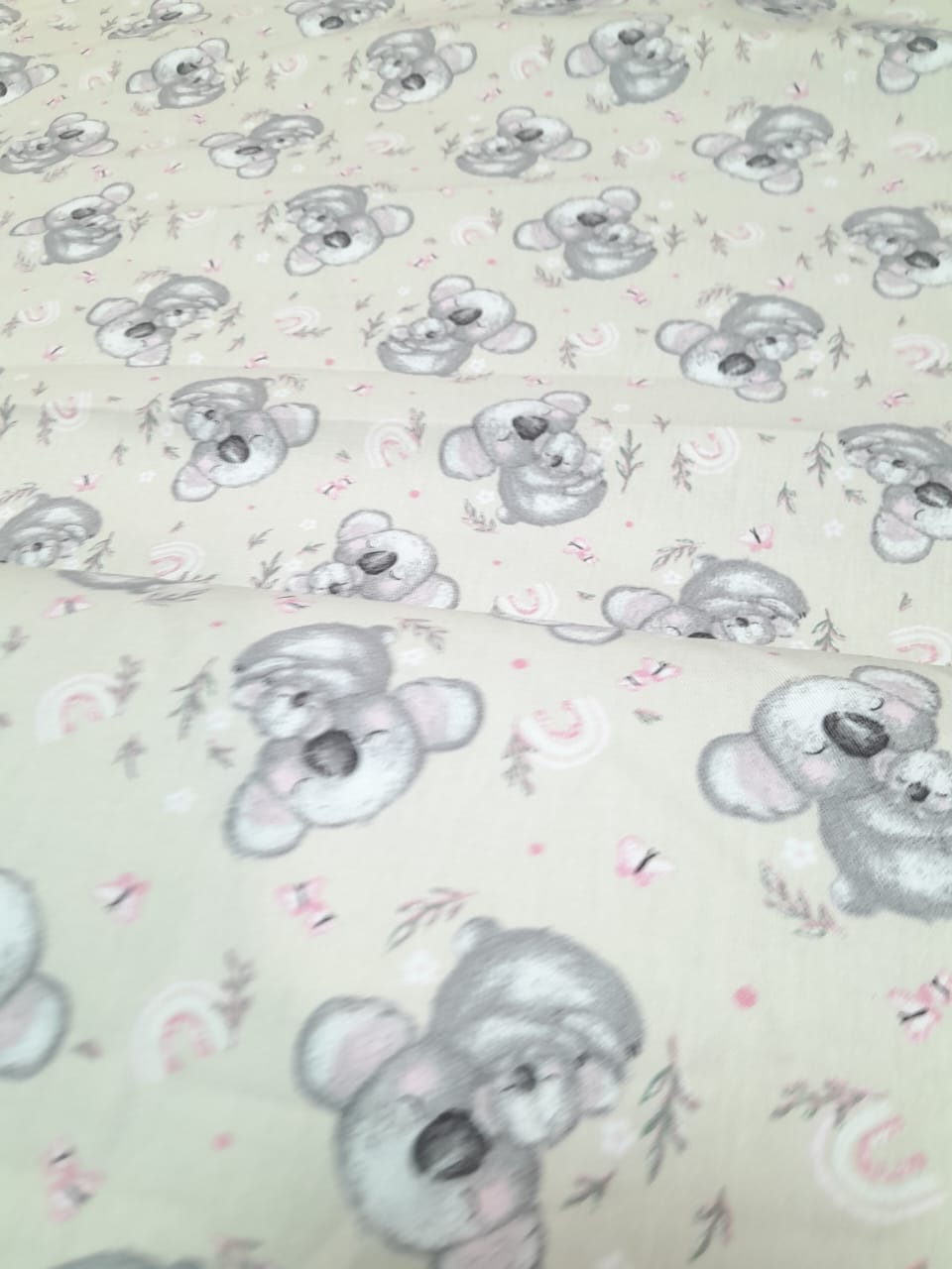 imagen de Gabardina estampada Koala